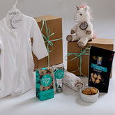 Unicorn Wishes baby gift box with Little Misty Unicorn toy and Australian baby essentials. New baby gifts, corporate maternity leave gifts. Baby girl hamper