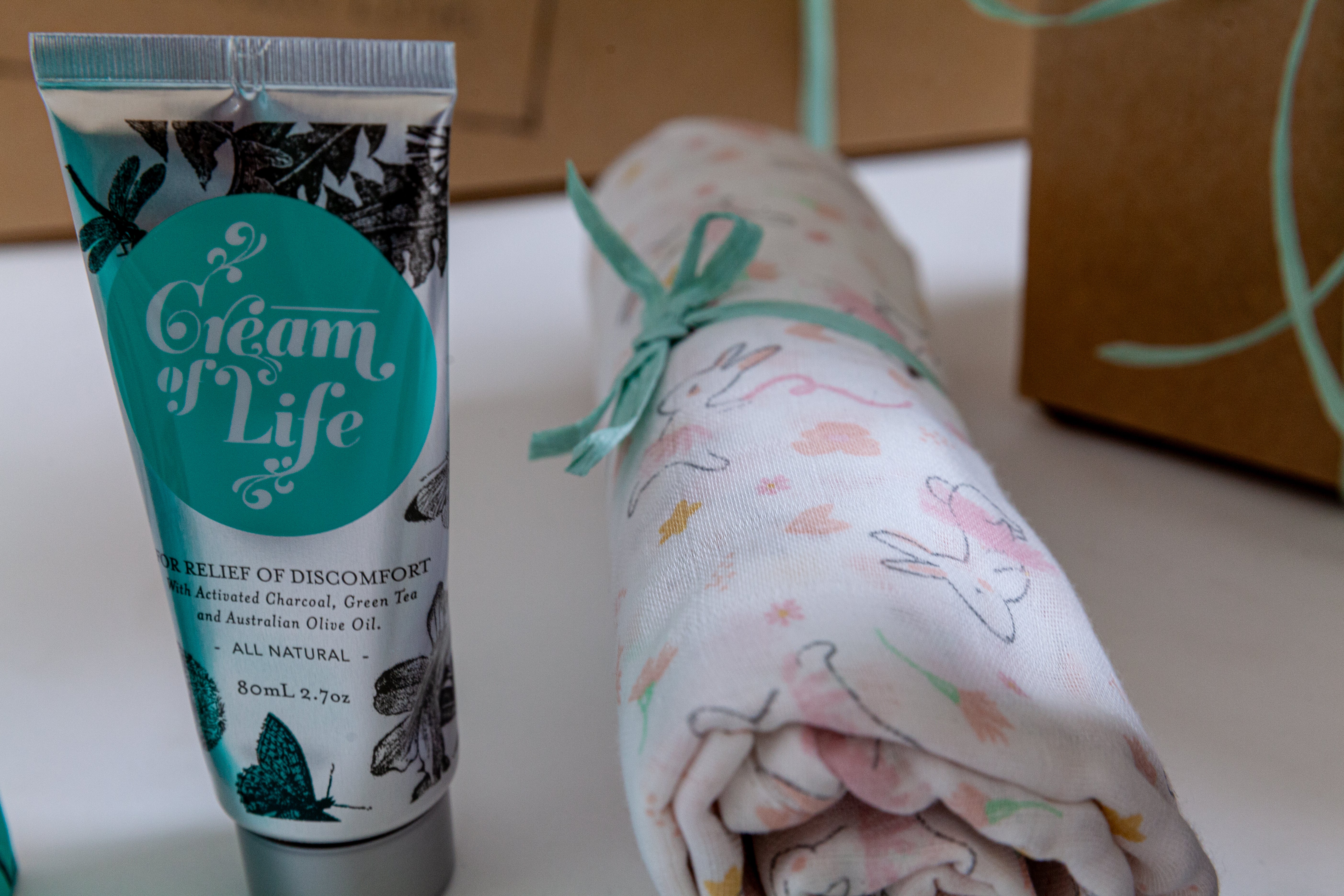 Premium baby shower hamper filled with newborn necessities, keepsake gifts and luxury baby accessories.