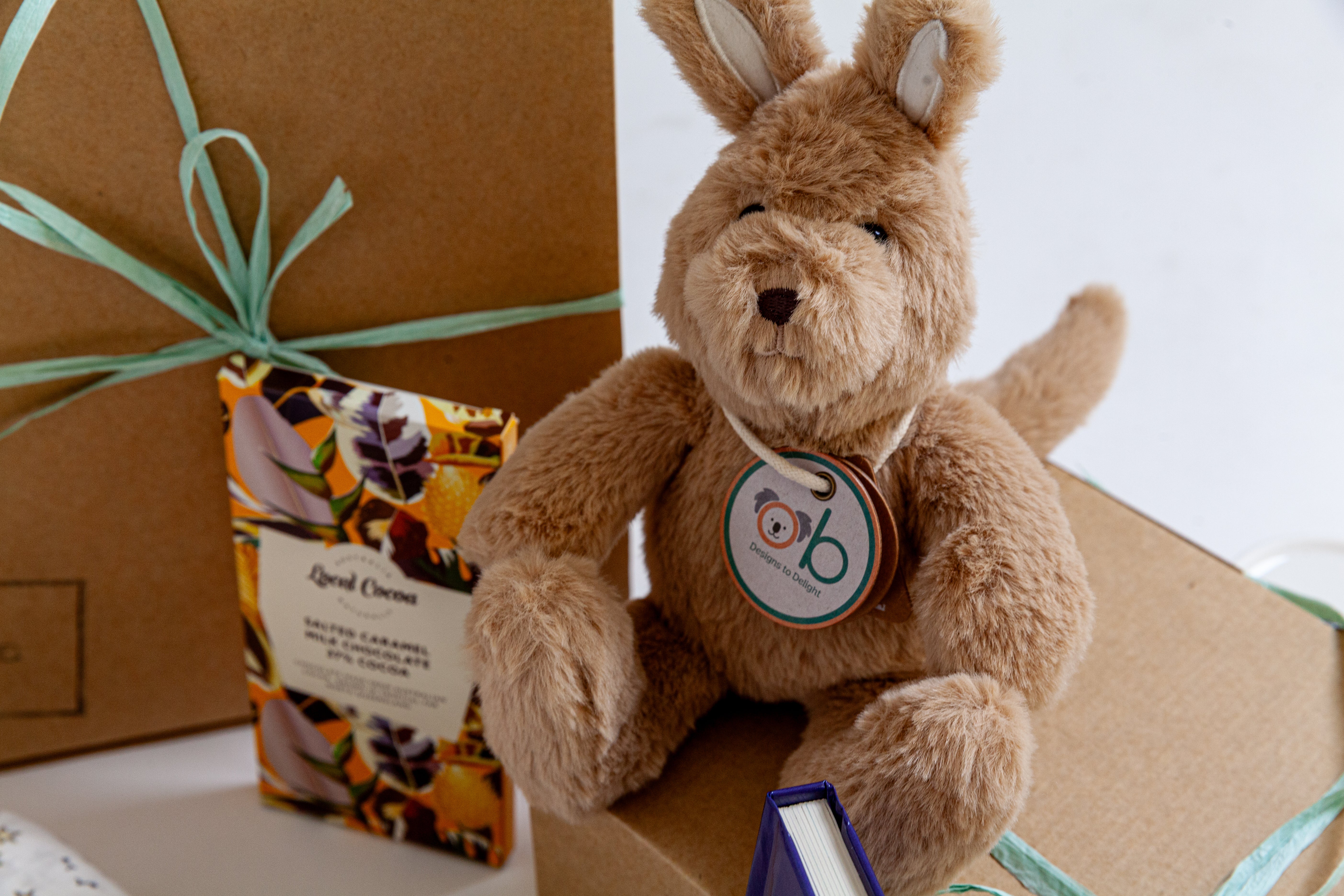 Newborn baby gift hamper Australia featuring high-quality baby essentials, comfort items and memorable keepsake gifts. Plush kangaroo soft toy. 
