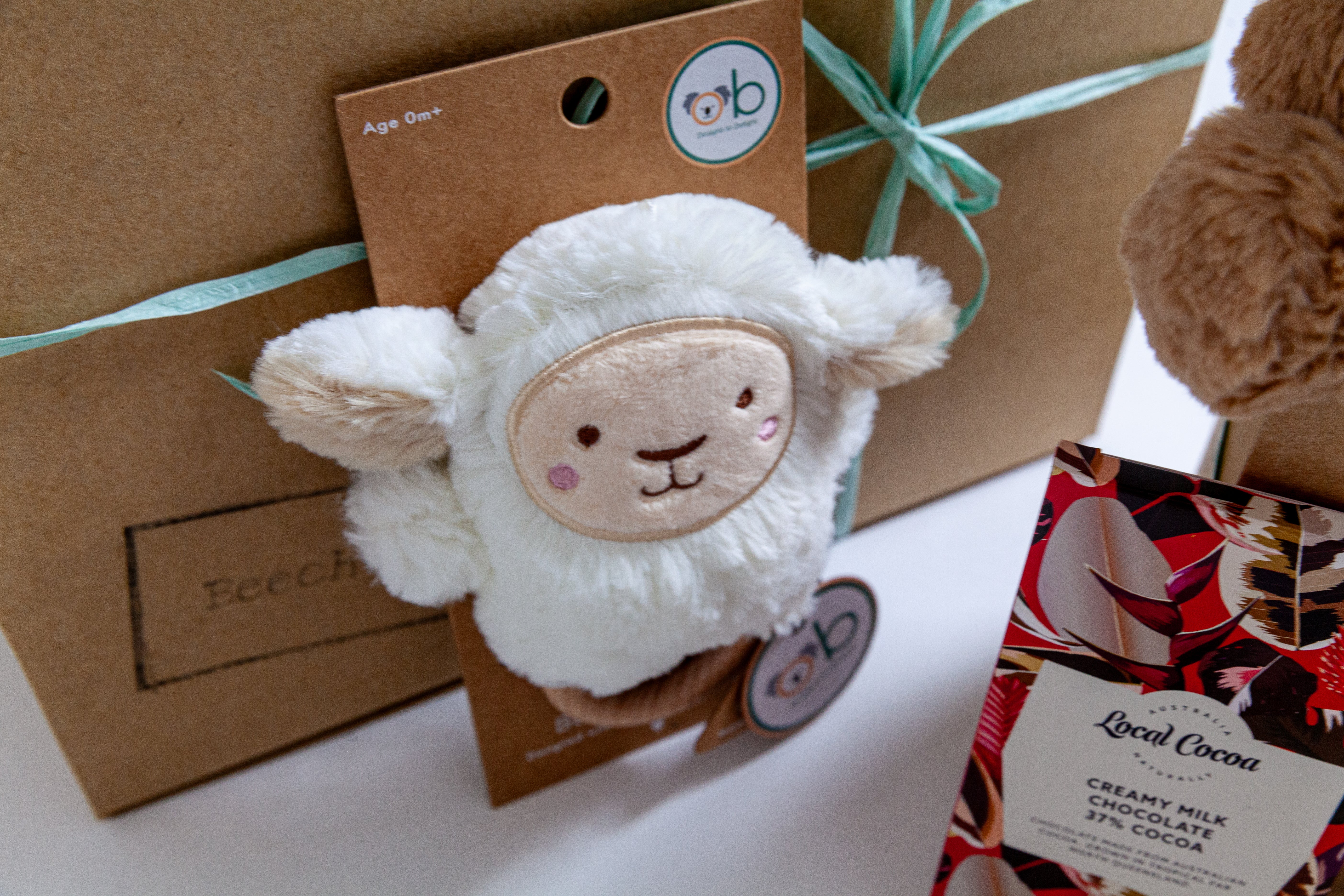 Baby white sheep plush toy, chocolate bar. best new gift for new baby and new mum hamper Australia.