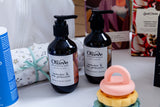 Olieve and Olie hand body wash and hand cream, New mum gift hamper featuring pamper products, wellness gifts and practical newborn essentials for new mothers.